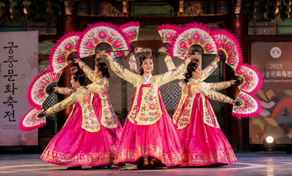 Traditional Korean fan dance performance at a cultural festival in Korea